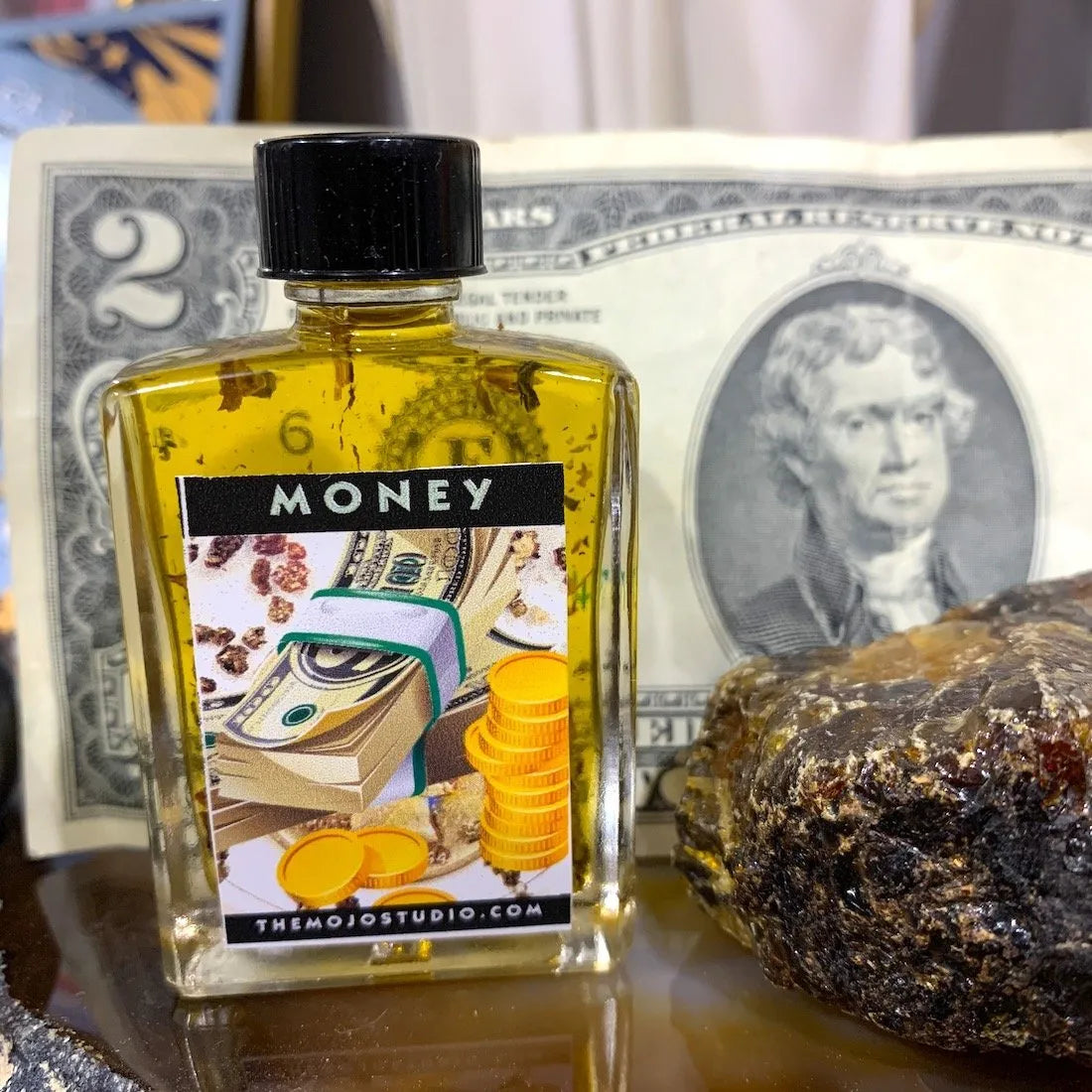 Money Oil – draw in financial security by Papa Gee